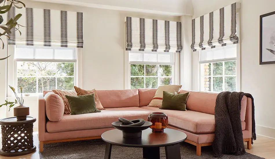 Den with premium roller shades