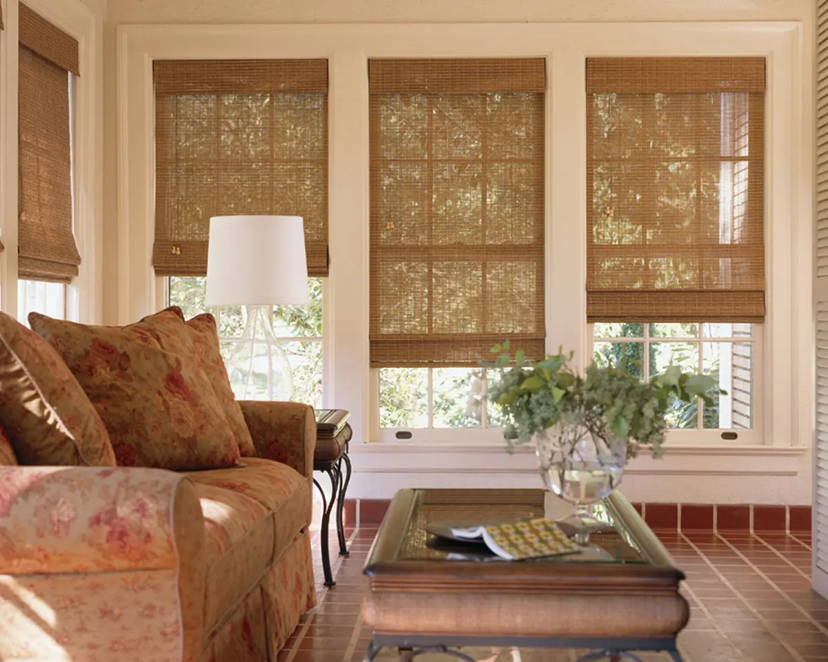 Natural woven wood shades in sunroom